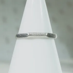 Faceted Platinum Band with Engraved Texture